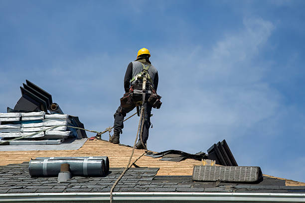 Professional Storm Damage Roof Repair technician working in Grimes, IA